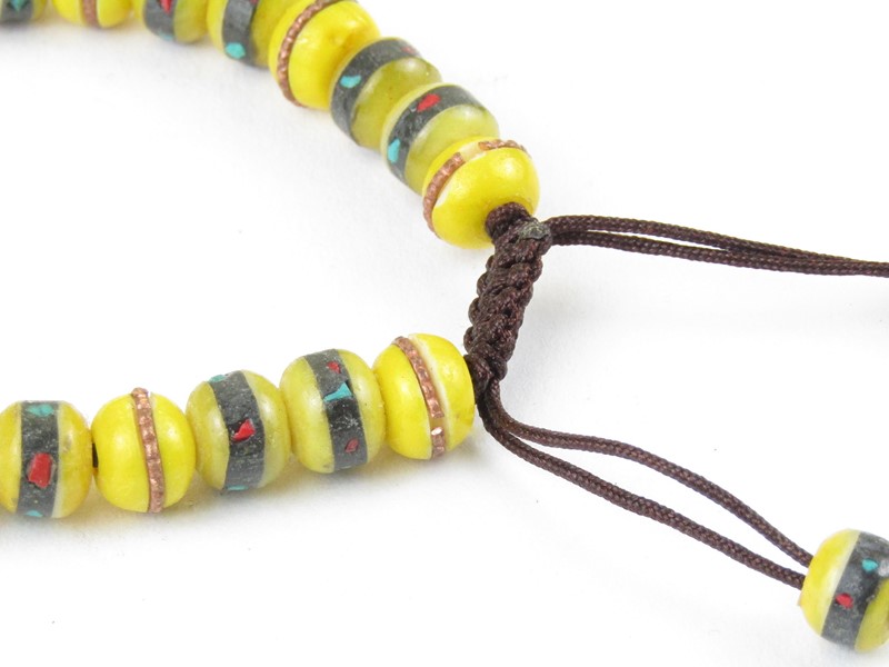 Náramek mála z vykládané kosti žlutý