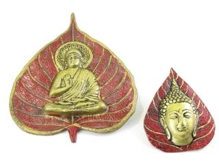 Buddha z kovu v listu a hlava Buddhy